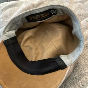 Medium tan wool Goorin bros newsboy flat cap worn sparingly